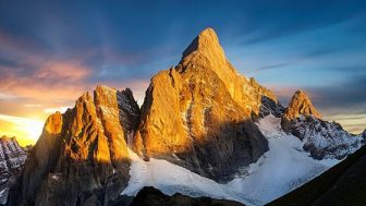 Sun rises on the pinnacle of a mountain - Xtravirt achieves Broadcom Pinnacle Status